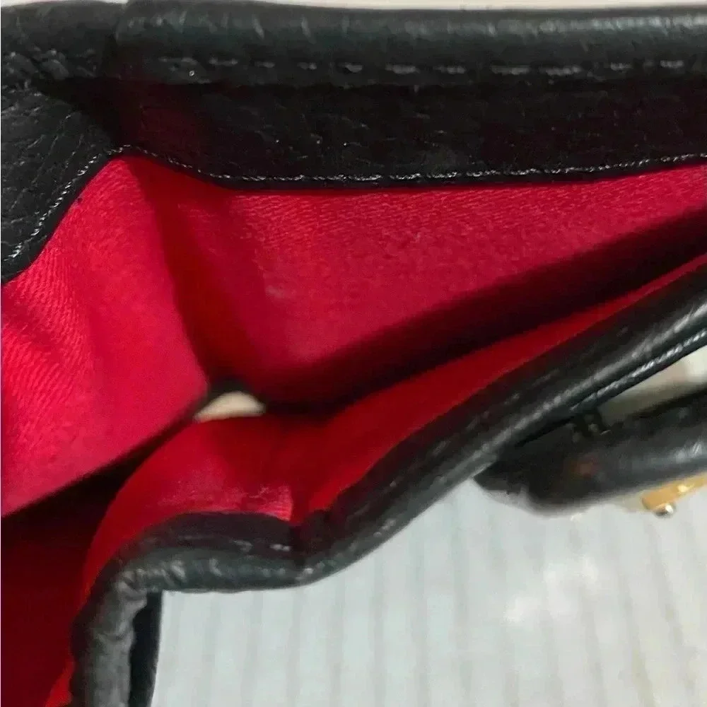 Dooney Bourke black leather wallet